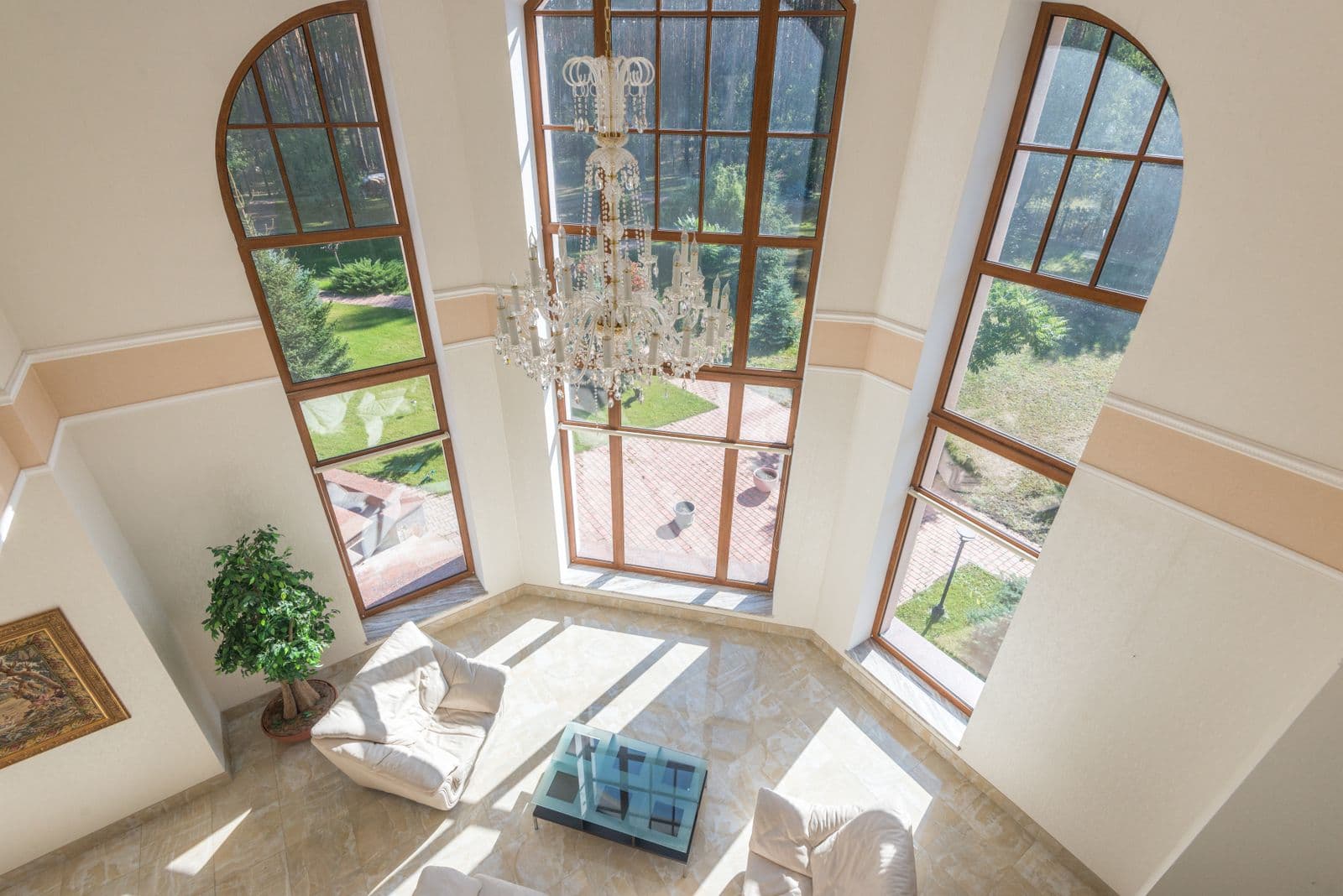 A double-height living room in a larger private residence